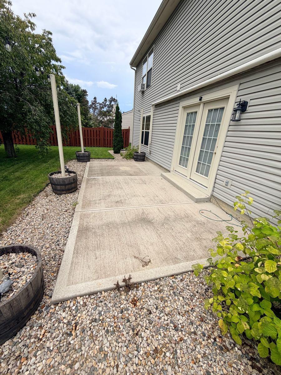 Back patio before pressure washing