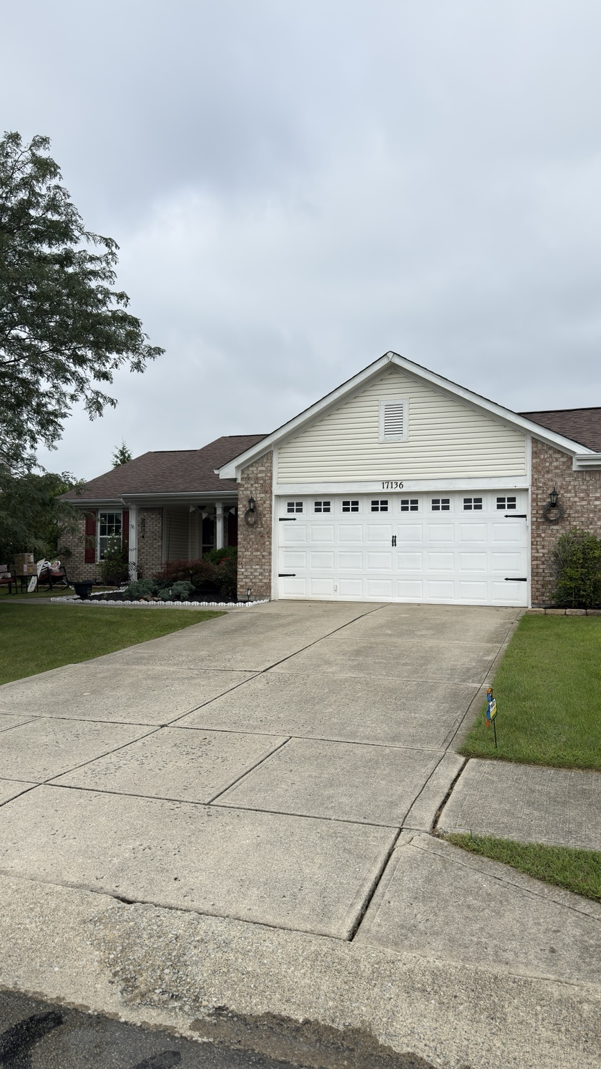 Driveway before pressure washing