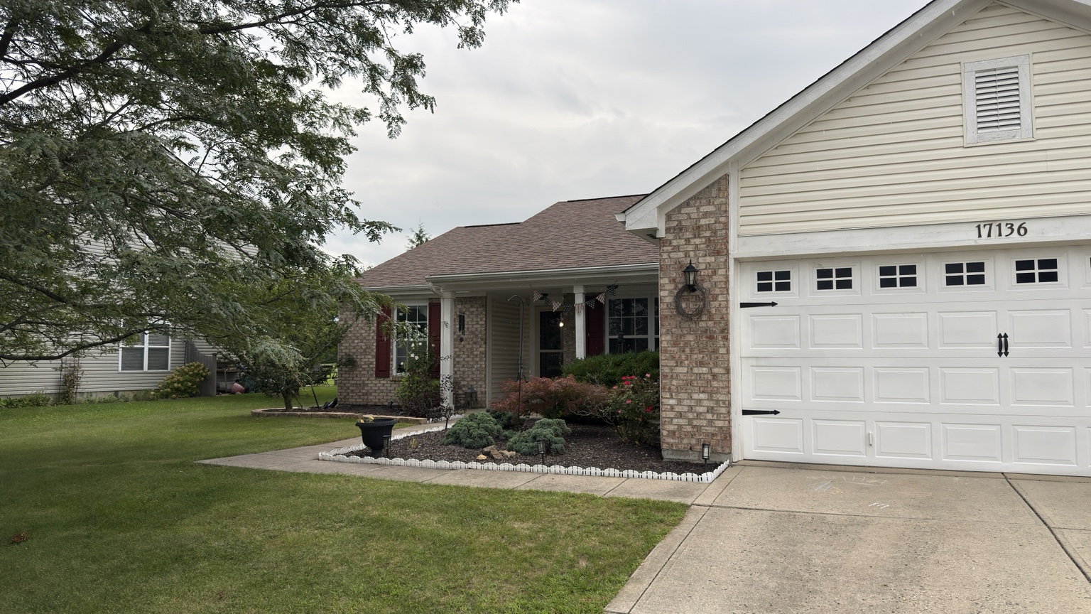 Front entry walkway and driveway before concrete cleaning
