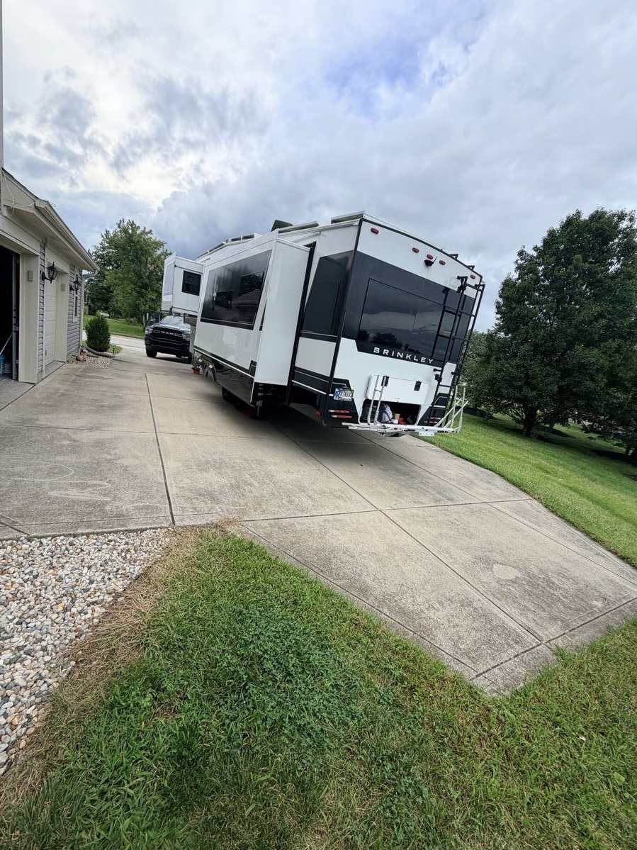 Large driveway before pressure washing
